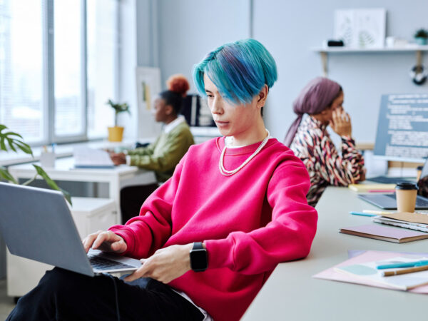 asian-young-man-using-laptop